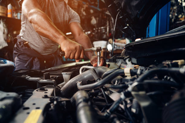 Technician working in the FALCON AUTO SERVICES workshop